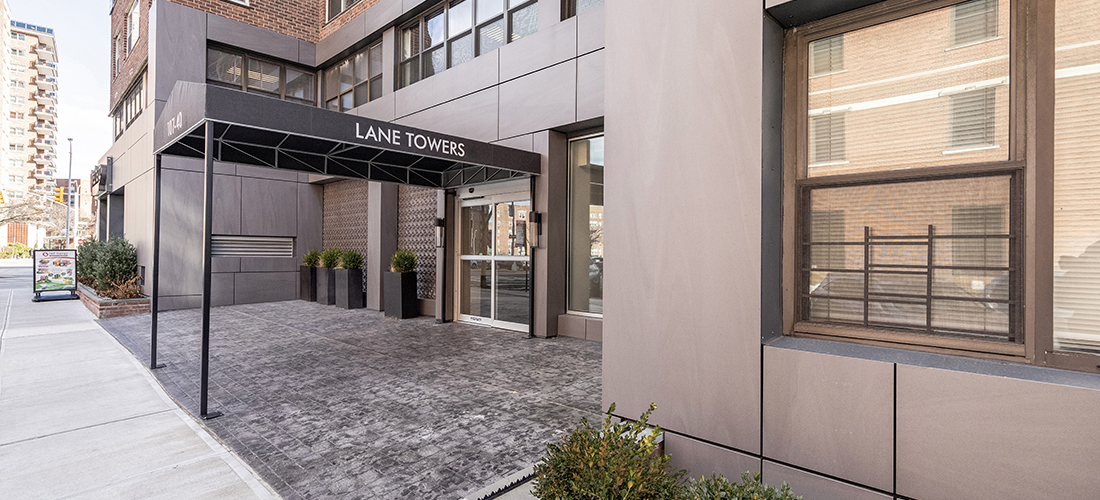 Lane Towers New York - reclad with new exterior paneling - entranceway